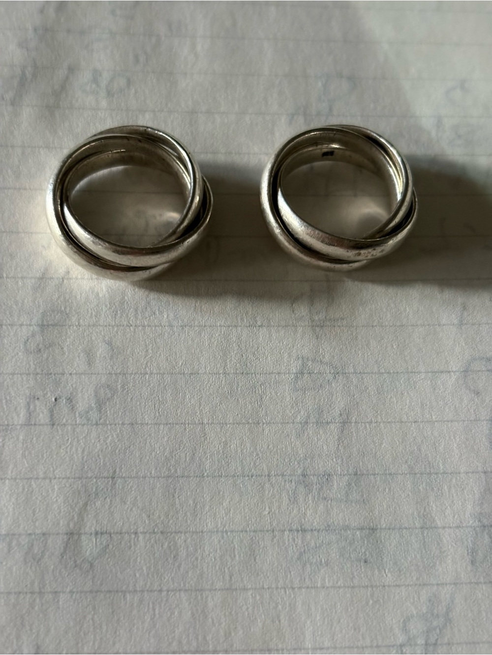 Classic Interlocking Silver Hoop 2 Rings - Silver one is size 6 other is 5.90